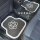 Camellia car floor mats featuring a stylish white flower design on a durable, stain-resistant surface for enhanced comfort an...