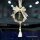 Elegant peace joy wheat car pendant featuring a golden charm, crystal beads, and a white tassel, perfect for rearview mi...