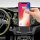 A hand holds a smartphone in a sleek 15w auto induction wireless car phone holder, charging on a modern dashboard with a vibr...