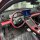 Chery fengyun a9l dashboard sun shade mat showcased in a luxurious car interior, featuring red and black accents and modern d...