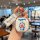A hand holds a jetour freelander key cover featuring a doraemon design, with a colorful cartoon character and doraemon text o...