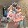 A hand holds a volkswagen car key cover featuring patrick star from spongebob, paired with a translucent patrick star charm, ...