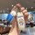 A hand holds a gac aion y plus key cover featuring a doraemon design, combining a blue and white color scheme with a playful ...