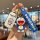 A hand holds a changan lumin car key cover featuring a cute pastel shell design with doraemon graphics, including a keychain ...