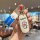 A hand holds a geely panda mini car key cover featuring a cute doraemon design on a silicone shell, perfect for emgrand gs gl...