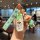 Hand holding a mazda 3 axela 2023 car key cover featuring a cartoon design with a plush keychain and wrist strap, perfect for...