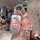 Hand holding a wuling starlight s car key cover featuring patrick star with a cute cartoon design and a matching keychain, pe...