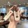 A hand holds a sleek, white honda key cover with and inscriptions, designed for 2-button folding car keys, perfect fo...