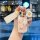 A hand holds a stylish wuling hongguang mini ev key cover featuring a macaron design with delicate butterfly patterns, comple...