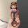 Hand holding a jaguar xel car key cover featuring a cute bear-themed design with a striped outfit, offering full protection a...