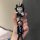Hand holding a volkswagen magotan b8 key cover featuring a cute cartoon character with bunny ears, paired with a get rich key...