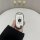 A hand holds a sleek white buick verano pro car key cover, featuring a carbon fiber shell design for models 2015-2023, set ag...