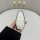 A hand holds a sleek, white hongqi hs5 car key cover with a full shell design, featuring four buttons for locking, unlocking,...