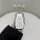 A hand holds a sleek geely starry starry l car key cover, featuring a carbon fiber design with four buttons for sound, lock, ...