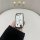 A hand holds a sleek, white and silver car key cover designed for skoda models like octavia, rapid, superb, kodiaq, fabia, an...
