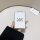 A hand holds the sleek im motors ls6 card key cover, featuring a minimalist design with drive to the next text and a modern l...