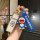 A hand holds a doraemon-themed car key shell case for wey vv7, featuring a blue doraemon charm and a matching keychain with t...