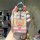 A hand holds a spongebob-themed card key cover for honda integra civic 11th gen nfc shell, featuring a cute design with spong...