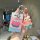 A hand holds a buick e5/e4 card key cover featuring patrick star from spongebob, paired with a matching translucent charm. th...