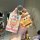 A hand holds a spongebob-themed zhijie s7 r7 nfc card key cover and matching keychain, featuring a cute design with a clear, ...
