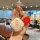 A hand holds a wuling binguo car key cover featuring a cute silicone design with text and a red charm that says , set ...