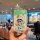 A hand holds a xiaomi su7 car key cover featuring a colorful cartoon design with a playful character and vibrant shapes, set ...