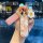 Elegant mazda axela car key cover featuring a floral design and pink leather strap, perfect for cx-3, cx-4, cx-5, mazda 3, an...