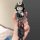A hand holds a stylish kia k5 car key cover featuring a cute cartoon character in a black outfit, complete with a get rich le...