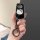 A hand holds a sleek black toyota car key cover featuring a cute hello kitty design, perfect for corolla, levin, rav4, and hi...