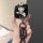 A hand holds a lynk & co 08 emp card-style key cover featuring a cute cartoon character in a black outfit, complete with a ge...