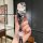 A hand holds a stylish roewe rx5 plus key cover featuring a cute hello kitty design with floral accents and a matching keycha...