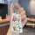 A hand holds a colorful, cartoon-themed key cover featuring playful designs and the phrase good luck, designed for lexus rx30...
