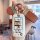 A hand holds a roewe rx5 car key cover featuring a playful design with cartoon characters and chinese text, offering full pro...