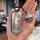 A hand holds a stylish aito m7 2025 car key cover featuring a cartoon dog and the phrase so excited, about to get rich! paire...