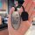 A hand holds a sleek nissan sylphy car key cover featuring a playful cartoon design with the text ... , suitable for al...