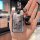 A hand holds a stylish roewe rx5 plus car key cover featuring a cartoon bear design with the text ... and a black rabb...