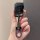 A hand holds a sleek black volkswagen car key cover, featuring a keychain with the vw logo, designed for models like passat a...