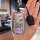 A hand holds a sleek toyota camry car key cover featuring a cartoon design with the text so ... , showcasing its stylish ...