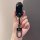 A hand holds a sleek black li auto l6 l7 l8 l9 car key cover, showcasing its full protection shell design with a stylish keyc...