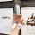 A hand holds a toyota key cover for camry, corolla, and rav4, featuring premium leather with a decorative horse charm, set ag...