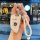 A hand holds a bmw key cover for 5 series, 3 series, x3, and x5 models, featuring a sleek white leather design with a sparkli...