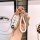 Elegant nissan qashqai key cover for 14th-gen models, featuring a gold-accented design with a white braided rope and diamond-...