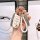 Elegant wuling hongguang mini ev key cover with gold accents and a braided white rope, featuring a stylish design for enhance...