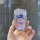 A hand holds a subaru key cover featuring a sparkling pink tpu design with the subaru logo, perfect for forester, outback, an...