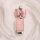 Elegant ford key cover for focus, mondeo, edge, and more, featuring a pink bow and heart charm on a soft fabric background.