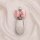 Elegant ora good cat key cover featuring a sleek silver design with a pink bow, crafted from premium full-body leather for st...