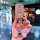 A hand holds a sparkling pink key cover for honda vehicles, featuring a butterfly charm and a sleek design, perfect for 2023 ...