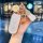 Elegant aito m9 key cover with a white leather-like design, adorned with a flower charm and gold accents, perfect for stylish...