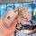 A hand holds a bmw key fob encased in a pink, diamond-embellished cover, featuring a matching keychain with a bmw logo and fv...