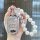Elegant chery arrizo 5 plus key cover with sparkling rhinestones and a pearl-accented wristlet, perfect for stylish car owner...
